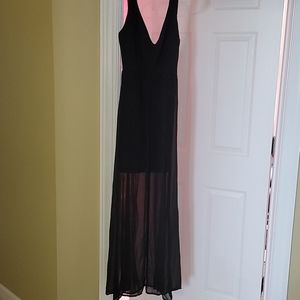 Black mini dress with sewn in sheer cover